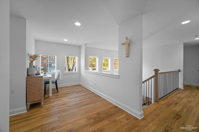 corridor featuring light hardwood / wood-style flooring