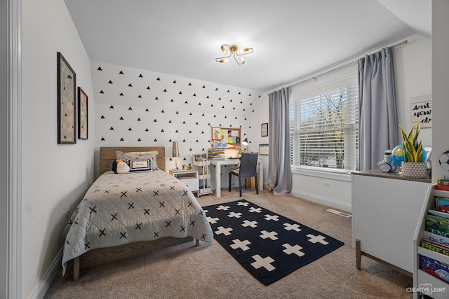 carpeted bedroom featuring lofted ceiling