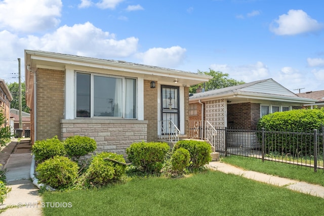 9349 S Halsted St, Chicago, IL 60620 - view of front of property with a front yard