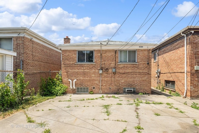 rear view of house with a patio area