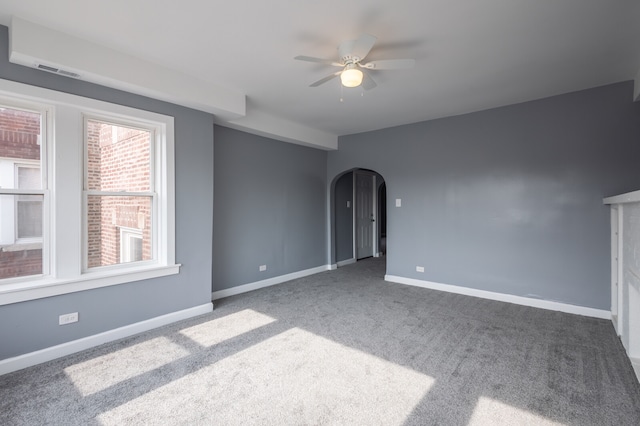 carpeted empty room with ceiling fan