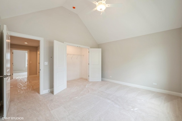 1060 Livingston Ave, Highland Park, IL 60035 - unfurnished bedroom featuring light carpet, a closet, high vaulted ceiling, and baseboards