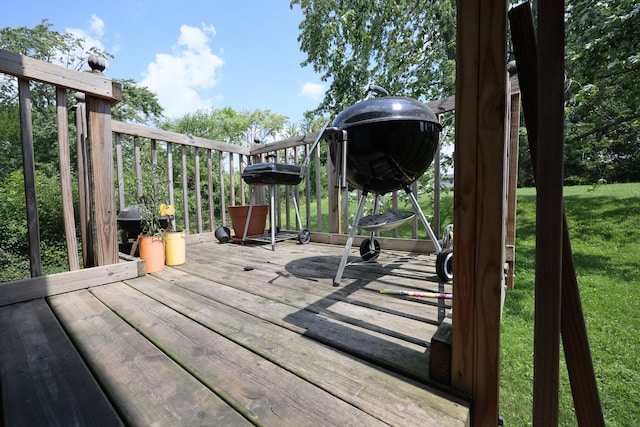 wooden deck with a yard