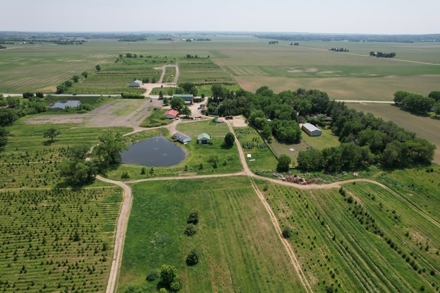 aerial view with a water view and a rural view