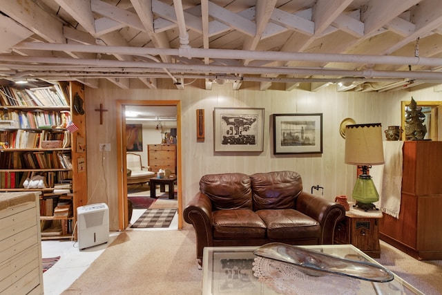 sitting room with wood walls