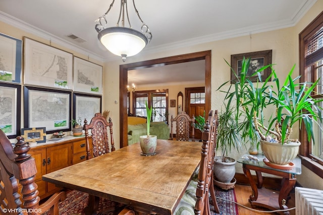 dining room with ornamental molding