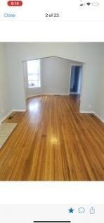 empty room featuring wood-type flooring