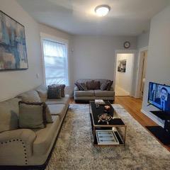 living room with wood-type flooring