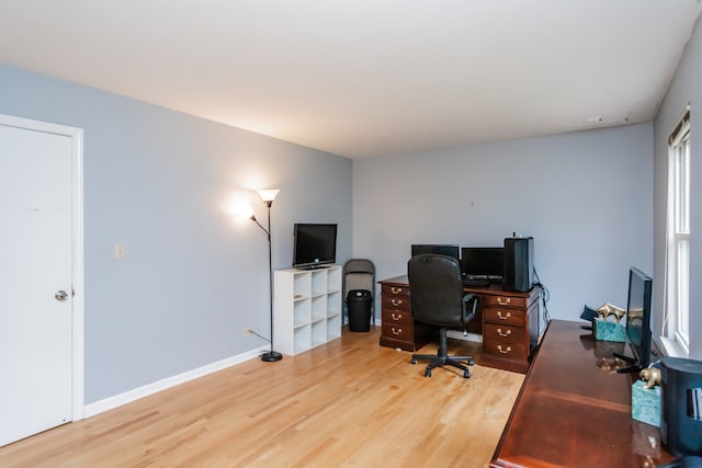 office area with light hardwood / wood-style flooring