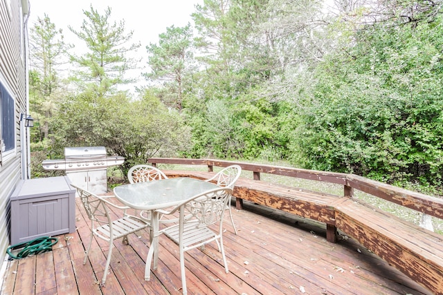 wooden deck with grilling area