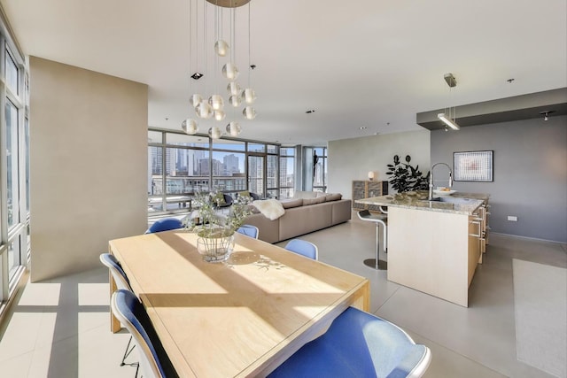510 W Erie St Unit 1801, Chicago, IL 60654 - dining area featuring a wall of windows and a city view