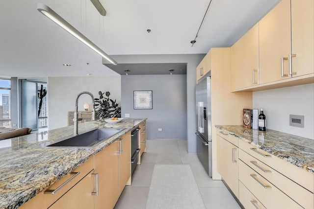 510 W Erie St Unit 1801, Chicago, IL 60654 - kitchen featuring high end refrigerator, light stone countertops, light brown cabinetry, and dishwasher