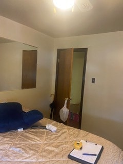 bedroom featuring ceiling fan