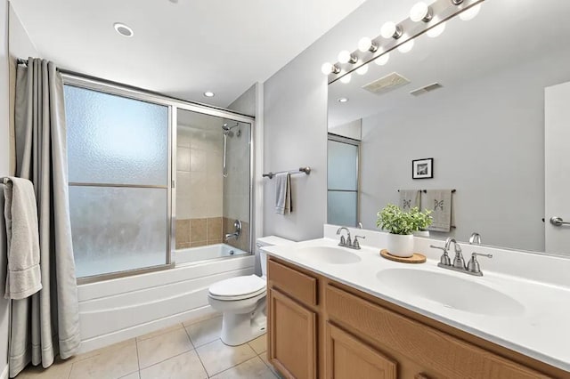 3811 S Langley Ave Unit 301, Chicago, IL 60653 - full bathroom featuring tile patterned floors, double vanity, and combined bath / shower with glass door