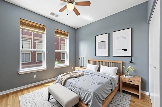 3811 S Langley Ave Unit 301, Chicago, IL 60653 - bedroom featuring light wood finished floors and ceiling fan