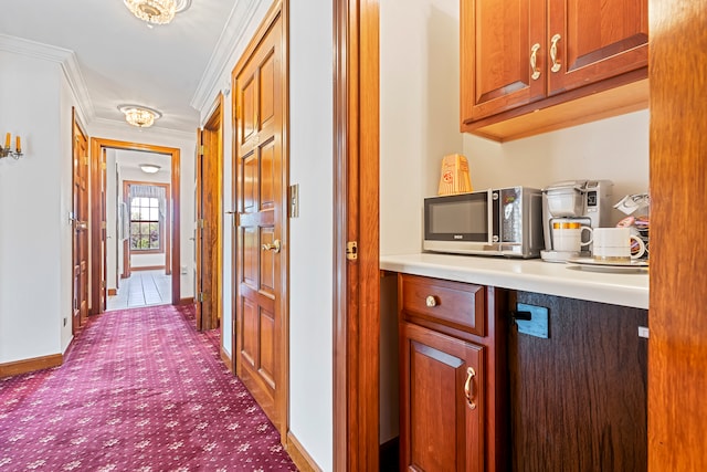 hallway with crown molding