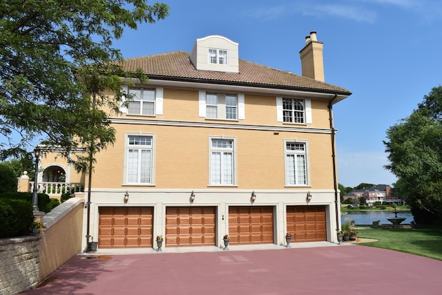 exterior space with a garage