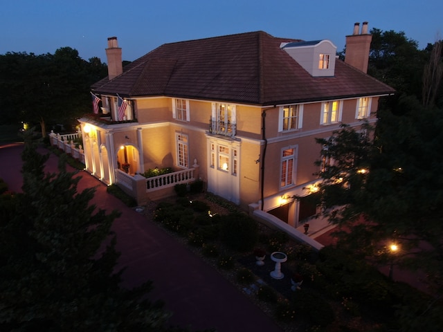 view of property exterior at dusk