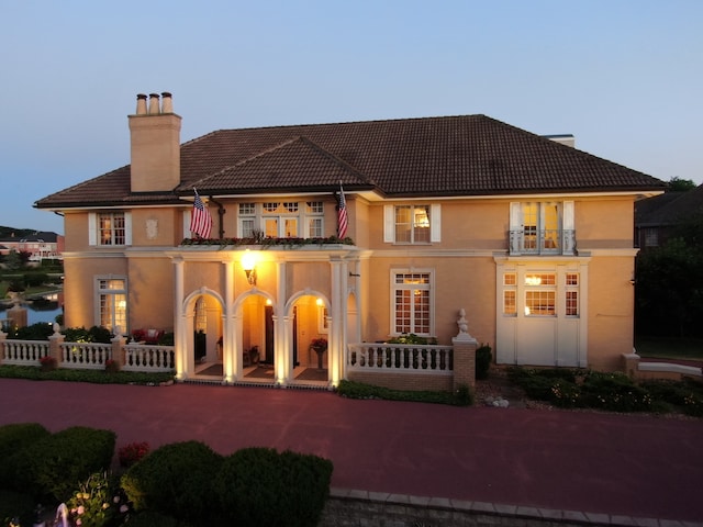 exterior space featuring a balcony