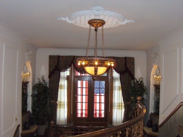 dining area featuring french doors and ornamental molding