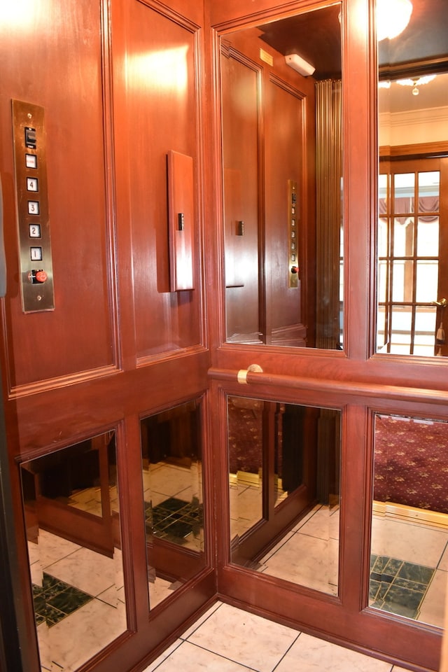 room details featuring crown molding and elevator