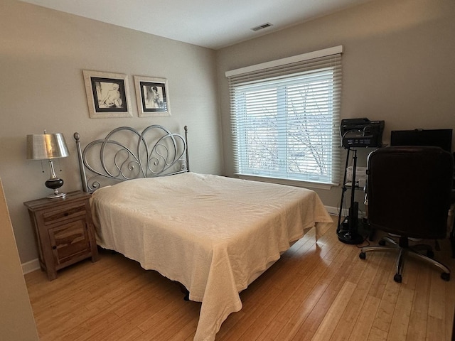 bedroom featuring light hardwood / wood-style floors