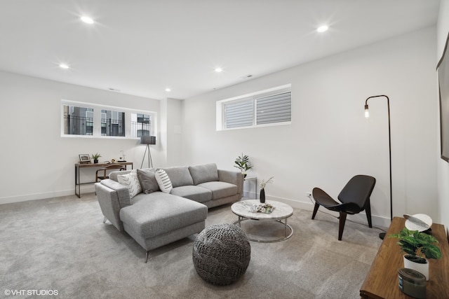 living room with light colored carpet