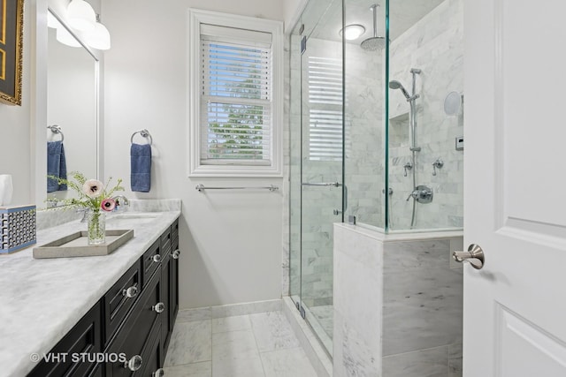2732 N Seminary Ave Unit 3, Chicago, IL 60614 - full bath with double vanity, baseboards, a shower stall, and marble look tiles