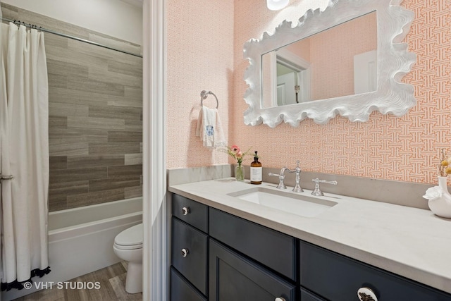 2732 N Seminary Ave Unit 3, Chicago, IL 60614 - bathroom featuring toilet, vanity, shower / bath combination with curtain, wallpapered walls, and wood finished floors