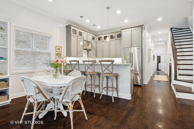 2732 N Seminary Ave Unit 3, Chicago, IL 60614 - dining area featuring dark wood finished floors, stairs, recessed lighting, and baseboards