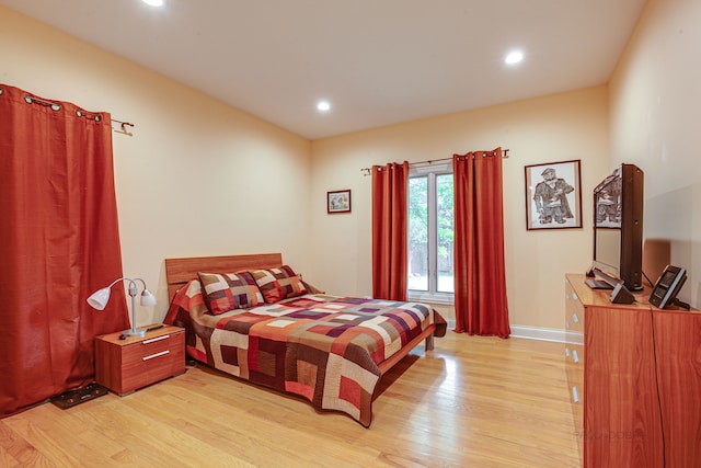 bedroom featuring light wood-type flooring