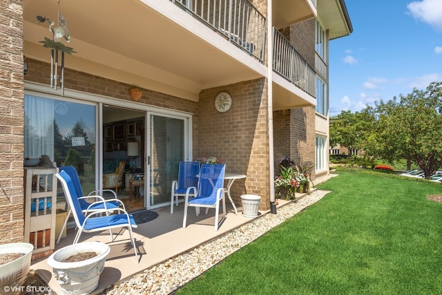 view of patio / terrace with a balcony