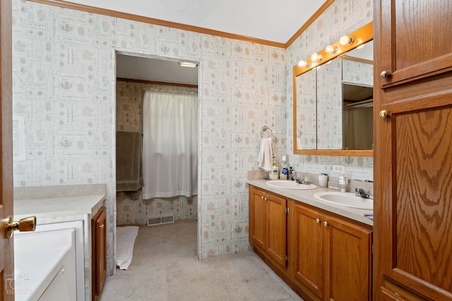 bathroom with crown molding and double vanity