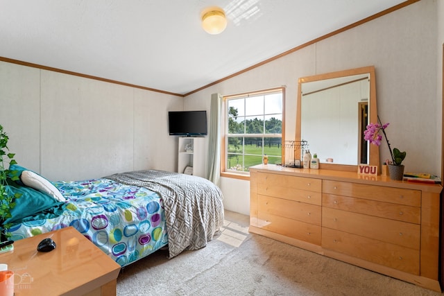 carpeted bedroom featuring lofted ceiling and crown molding