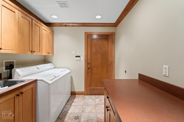 clothes washing area featuring independent washer and dryer, light tile floors, hookup for a washing machine, ornamental molding, and cabinets