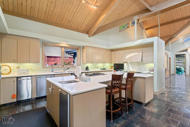 kitchen with stainless steel dishwasher, a kitchen island with sink, dark tile flooring, and wooden ceiling