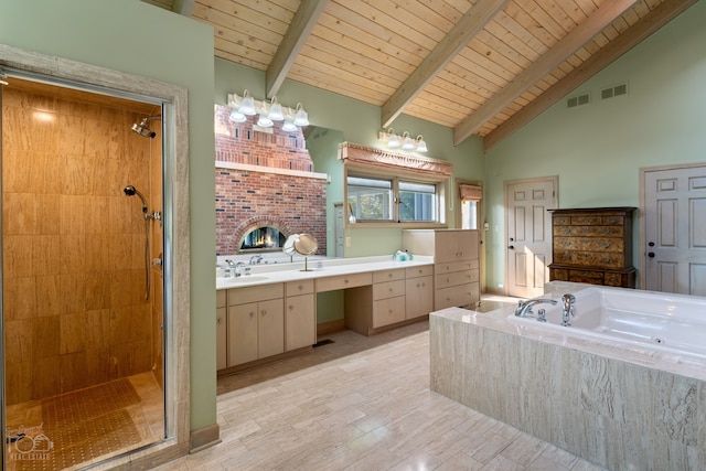 bathroom with oversized vanity, wood ceiling, separate shower and tub, and beamed ceiling