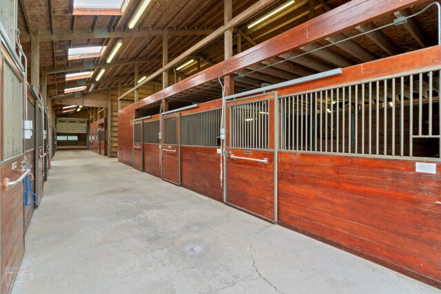 view of stable with an outdoor structure