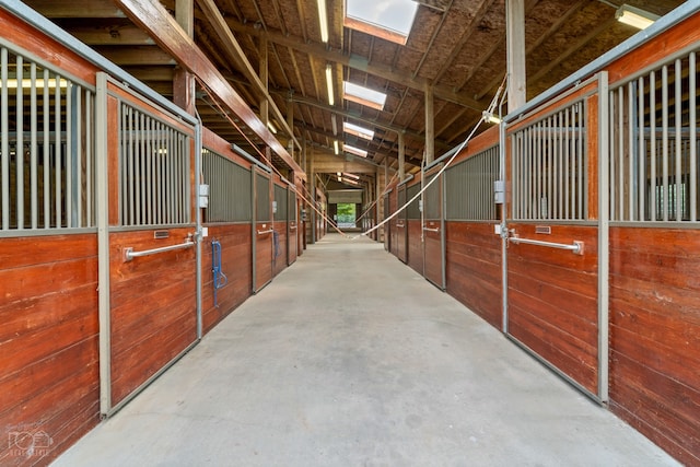 view of horse barn featuring an outdoor structure