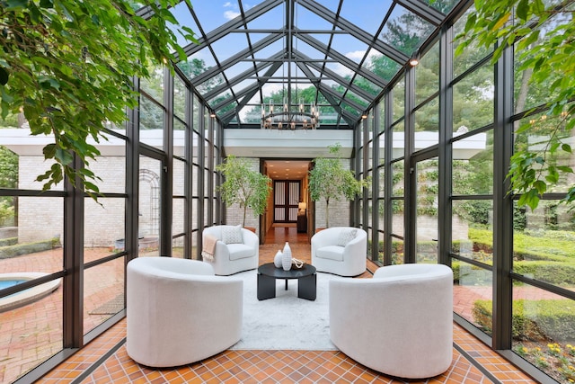 sunroom / solarium with lofted ceiling with skylight and plenty of natural light