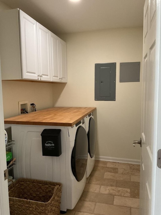5203 Glenbrook Trl, Mchenry, IL 60050 - laundry area featuring electric panel, cabinet space, light stone finish flooring, and washing machine and clothes dryer
