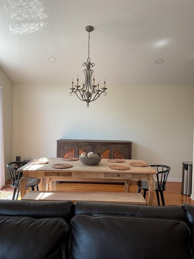 5203 Glenbrook Trl, Mchenry, IL 60050 - dining space with wood finished floors and a chandelier