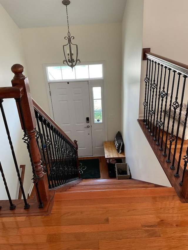 5203 Glenbrook Trl, Mchenry, IL 60050 - entrance foyer with wood finished floors and a chandelier