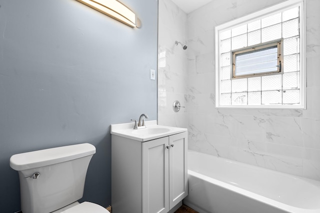 full bathroom with plenty of natural light, vanity, and toilet