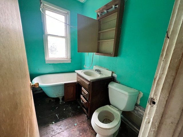 bathroom featuring toilet and vanity