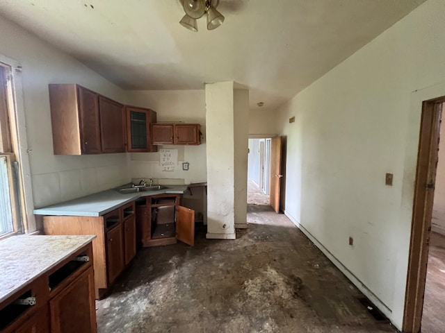 kitchen with ceiling fan and sink