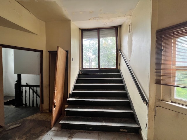 stairs with a wealth of natural light