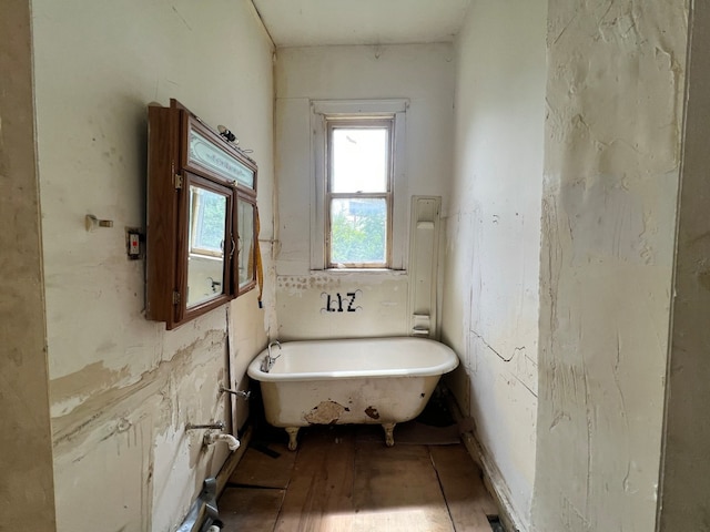 bathroom with a washtub