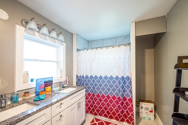 bathroom with vanity and curtained shower