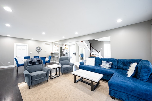 living room with light hardwood / wood-style flooring